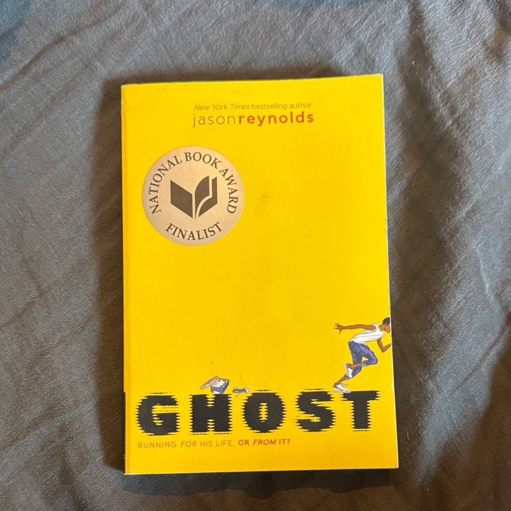 Ghost by Jason Reynolds - Bright Yellow Young Adult Paperback